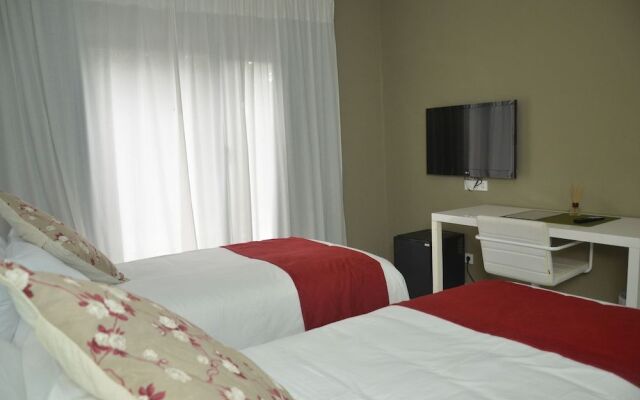 Magno Suites Hotel