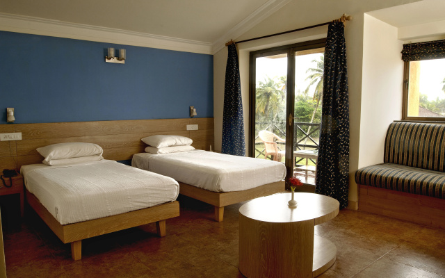 Whispering Palms Beach Resort – Guest Rooms – Candolim