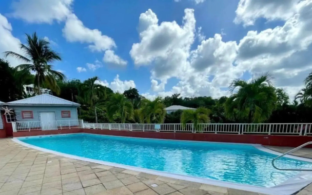 Appartement 2 piscines et vue mer