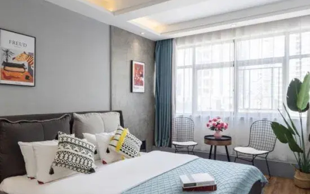 Qianxi Yuexiang Homestay (Erqi Wanda Plaza Jinrong Textile City)