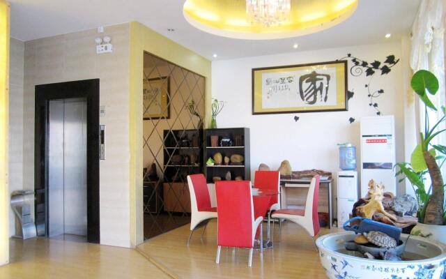 Hezhou E-age Hotel