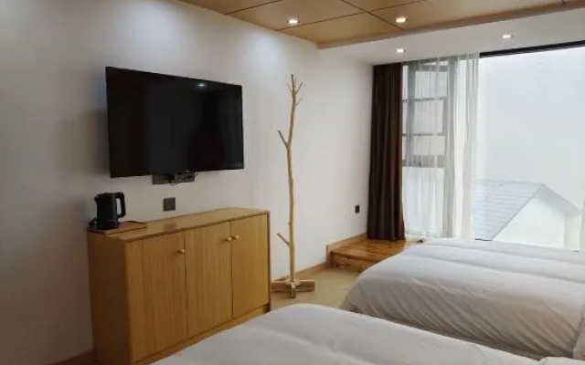 Lushan Qierbushe Hostel