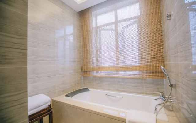 Xinhualian Lv Xin Gu Hotel