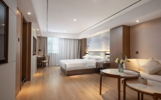 Taibai Restaurant Boutique Garden Hotel (West to Jining North Bus Station)