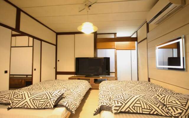 Sapporo Dome Front House