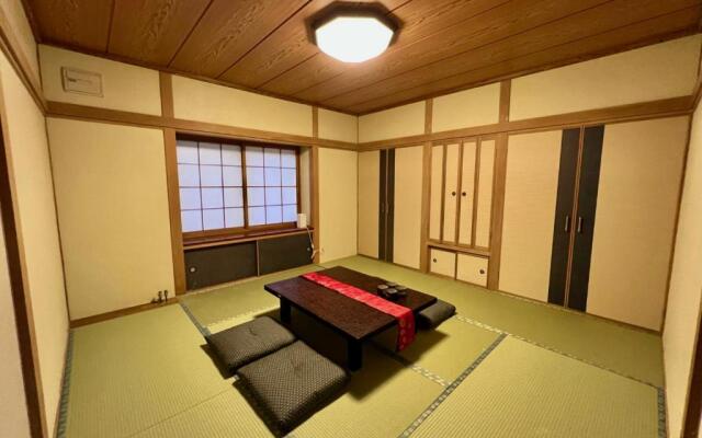 Yellow House by Lake Toya