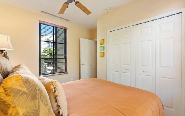Luxe! Impressively designed 2nd-floor unit in Coco done in red and orange hues