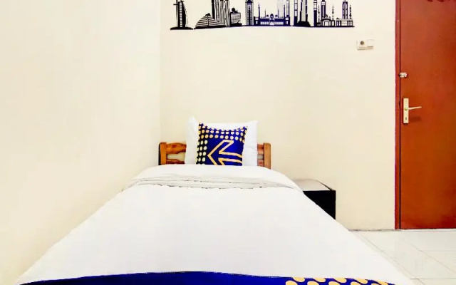SPOT ON 3979 Wisma Purimas Syariah – Guest Rooms – Depok
