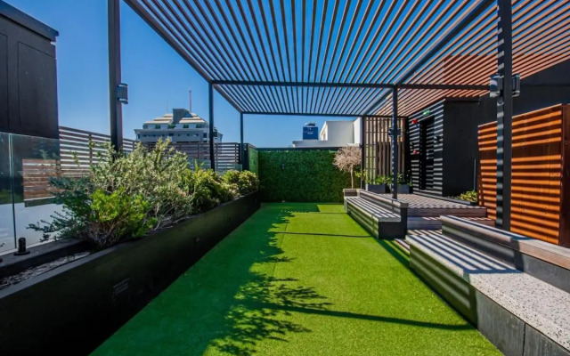 City Oasis Apartment with Rooftop Pool!