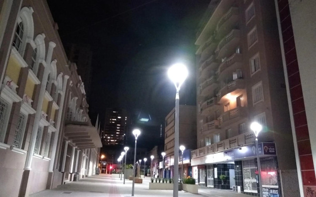 Quarto aconchegante em Apê, no Calçadão