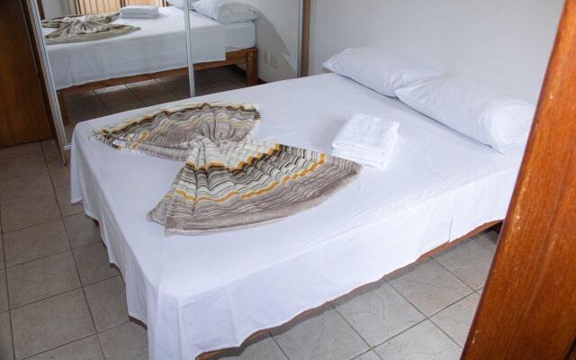 Casa de 2 Suítes com Internet Rápida e Comodidades