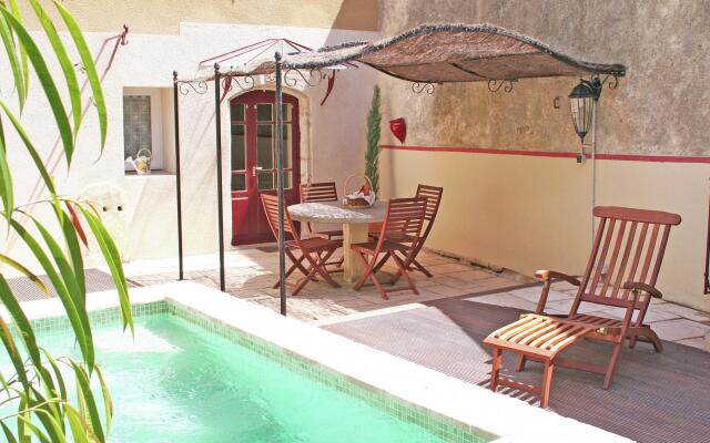 Alluring holiday home in Cazouls D'hérault with pool