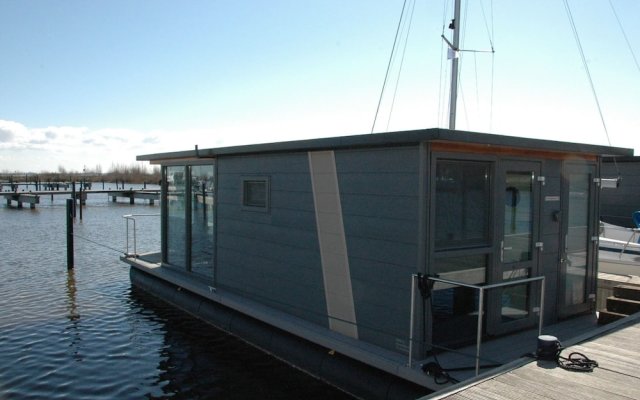 Beautiful Houseboat in the Harbour of Volendam Near Centre