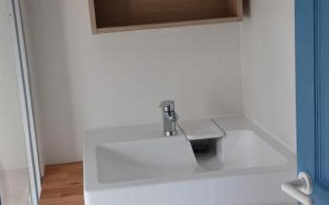 Maison au milieu des pins entre golf et océan