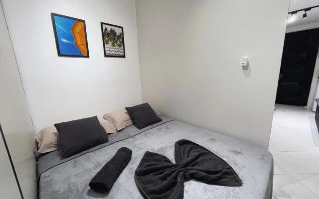 Loft com vista lateral para o mar