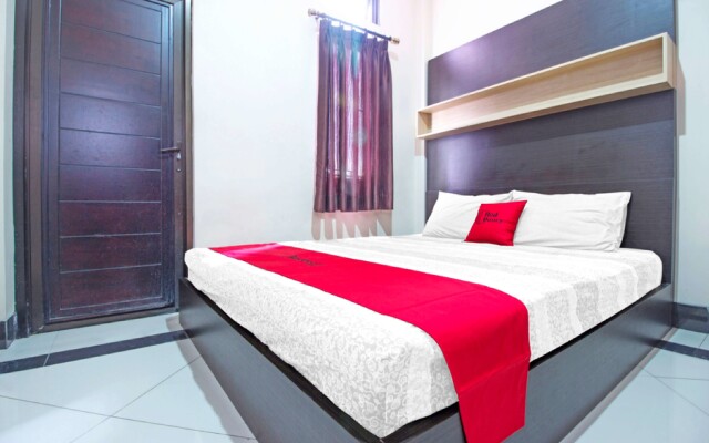 RedDoorz Plus near Isola UPI