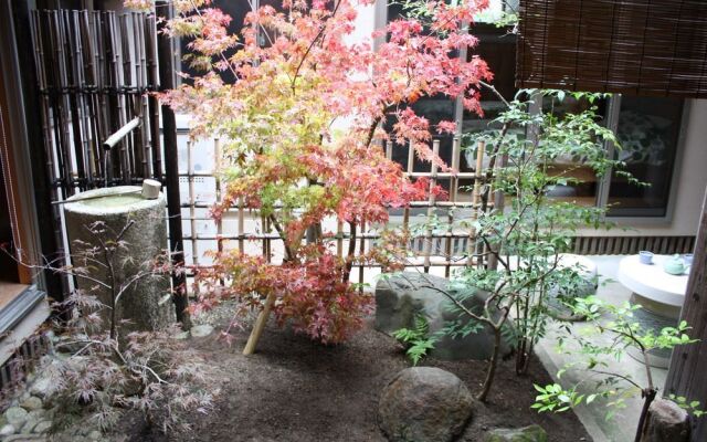 Nishinokyouharamachino Ie