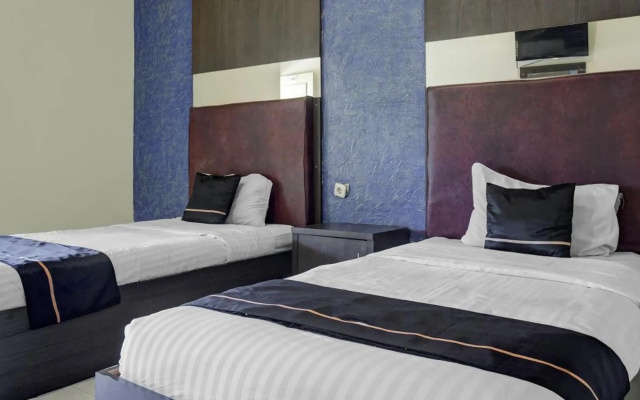 Hotel O near Universitas Widya Dharma formerly Nugraha Residence – Guest Rooms – Palembang