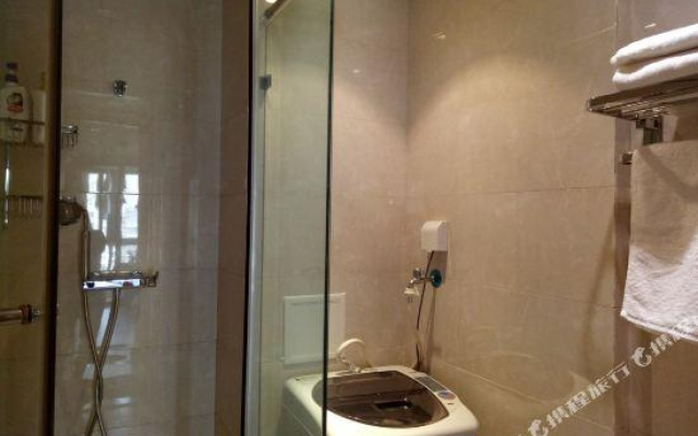 Huacai Apartment Hotel (Beijing Qilinshe)