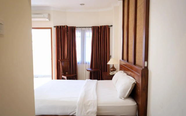 RedDoorz Premium @ The Garden Suites Solo
