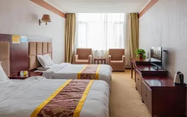 Wuchuan Minghao Business Hotel