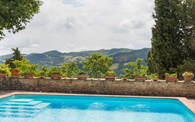 House on the Property Next to an Ancient Villa With a View of the Hills and Pool