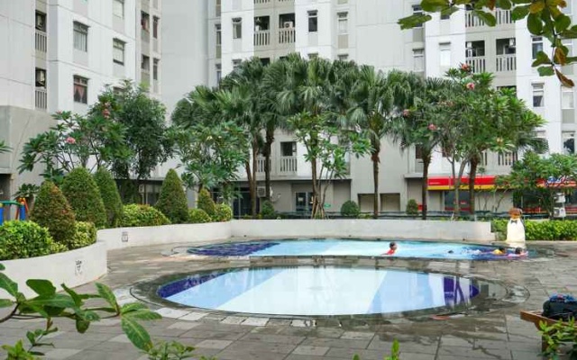 2BR with Direct Access to Pool at Green Bay Apartment By Travelio – Pool – Jakarta