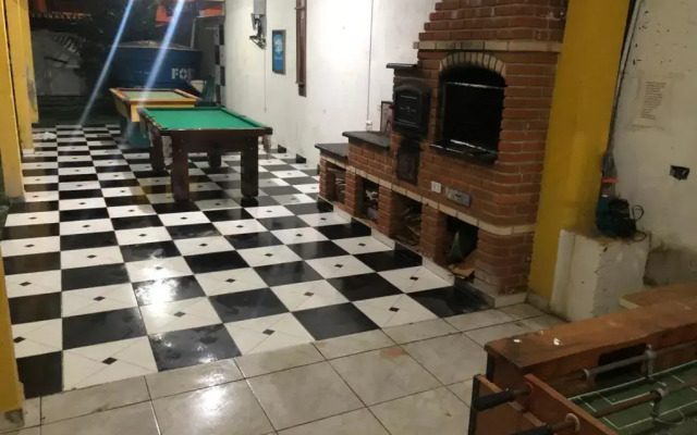 Ótima casa com piscina em Praia Grande