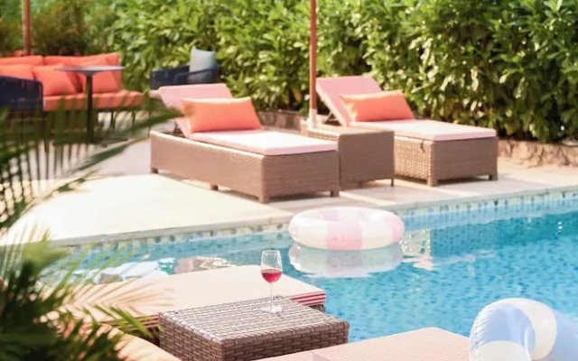 Signature By M Village Beachfront Hotel