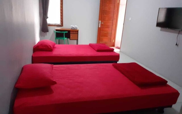 Nabila Syar i Guesthouse by ZUZU