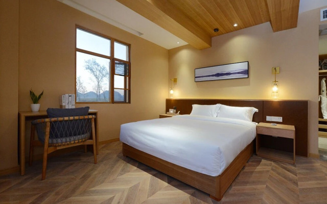 Puzhehei Xiyard Resort Hotel