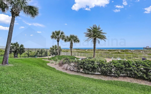 Spacious Oceanfront Condo, Easy Access to Private Fishing Pier by RedAwning