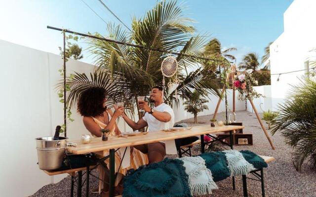 The Palm Leaf Apartments
