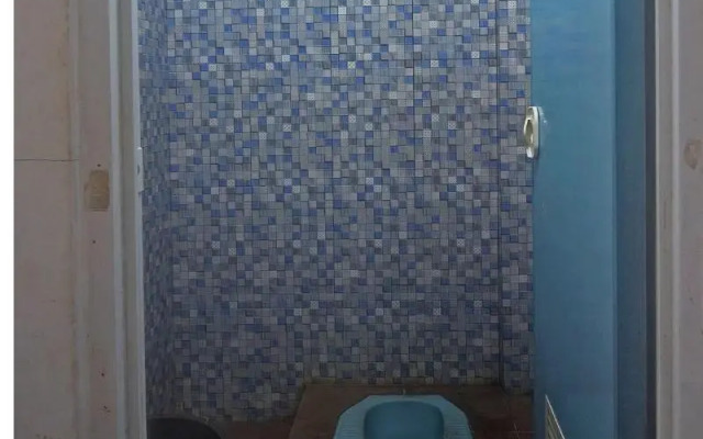 SPOT ON 91799 Sosonopan Homestay Near LANTAMAL VIII MANADO