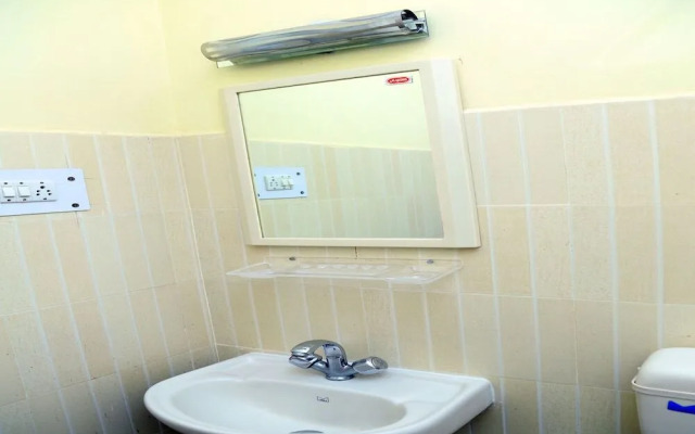 Vrinda Paradise by OYO Rooms