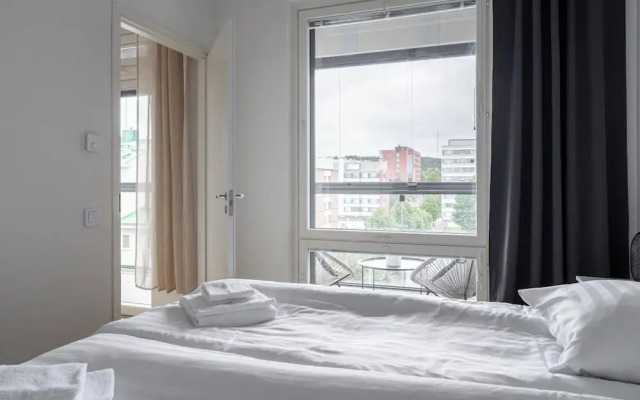 Modern 2BR Apartment with Sauna & Large Balcony