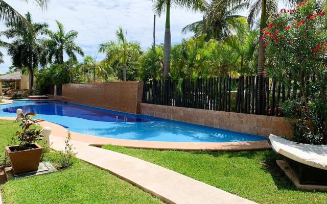 Relajate hermoso jardín y 2 piscinas