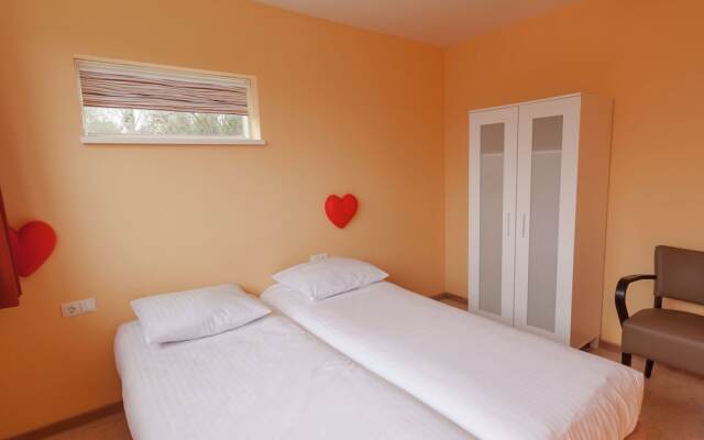 Cozy decorated house with fireplace, surrounded by forest