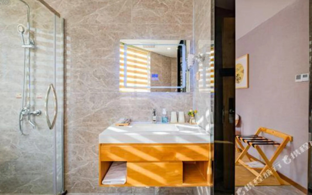 Home Inn Huaxuan Select Hotel (Jiaxing Bagua Band Store)