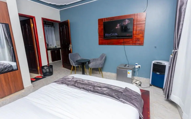 The Den Soroti White