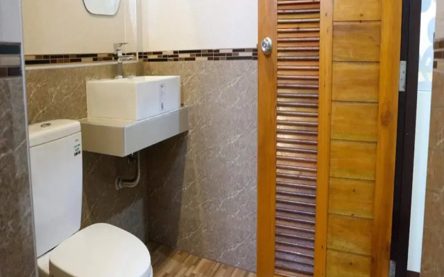 Capital O 75521 Sang Siri Apartment