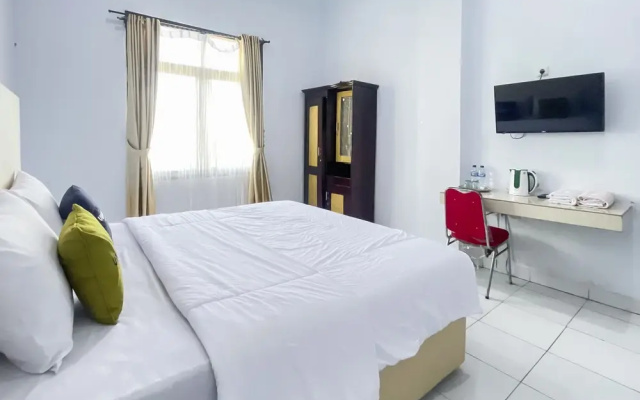 Urbanview Hotel Grand Seven One Kota