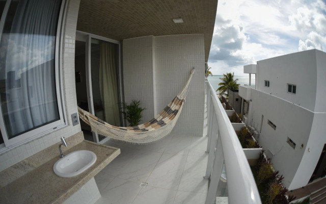 Pé na areia do Caribessa - Branco Haus