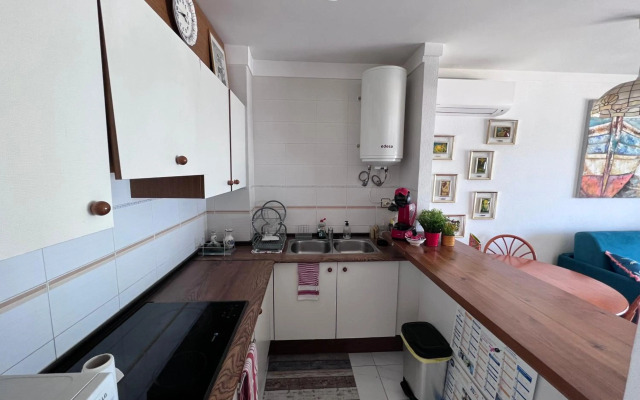 Bonito apartamento con vistas al mar y piscina