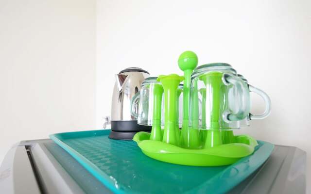 Furnished Studio with Comfortable Design Green Pramuka Apartment