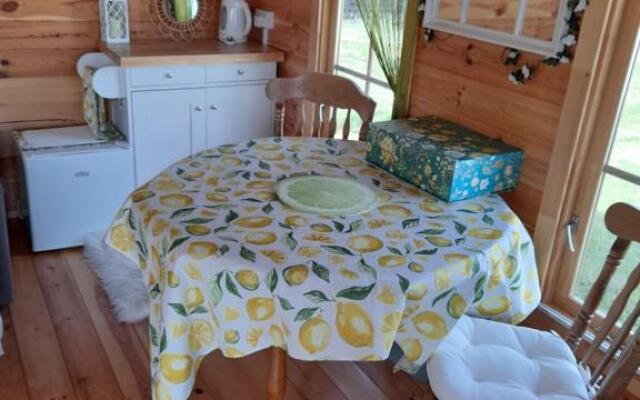 Log cabin retreat and luxury bell tent