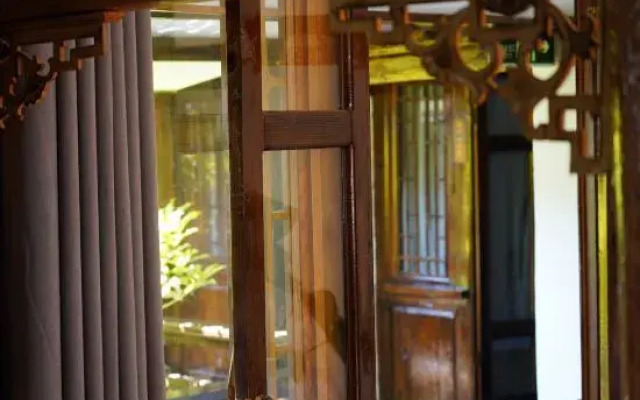 Lijiang Juyouzhu Inn (Sifang Street Mufu Branch)