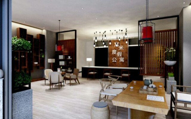 Yumi Apartment Xishuangbaina Branch