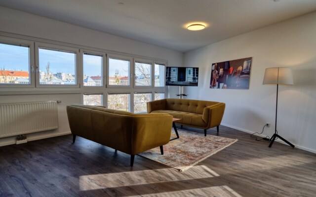 URBAN ISLAND - Riverside Apartments