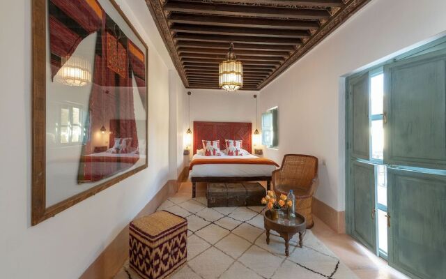 Riad Le J